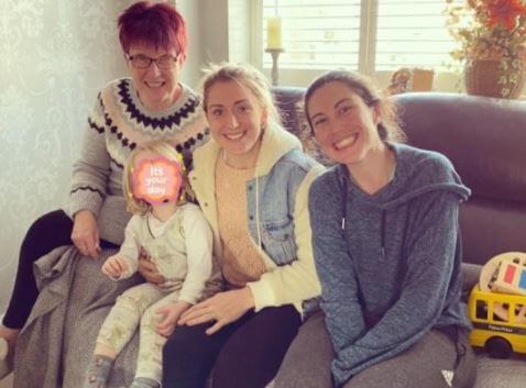 Glenda Trott with her grandson and daughters Laura Kenny and Emma Trott.